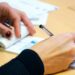 Milei elimina el Impuesto al Cheque para fintech y empresas cripto registradas